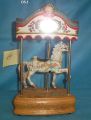 T. Fraley Palamino horse with rounding board